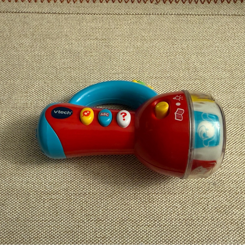 VTech Spin Learn Color Flash Light Teaches Colors, Numbers, and Musical Songs